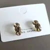 Pendientes de Cristal Amarillo Ahumado Serie de Colores Cálidos Diseño de Nicho Retro Coreano para Otoño e Invierno, Pinzas para Orejas Tipo Bobina de Mosquito para Orejas sin Perforar