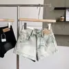 Shorts de mezclilla estilo retro americano para mujer, nuevo estilo verano 2026, línea A favorecedora para figuras petite, pierna ancha, ultra cortos, hot pants