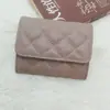Bolsa de Monedas Corta Estilo Chanel de Piel de Oveja Moda para Mujer 2024 Nueva Multifunción Compacta para Monedas Almacenamiento de Certificados