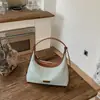 Bolso Cruzado Minimalista Versátil de Moda 2026 para Uso Diario Transfronterizo de Nicho Gran Capacidad de Hombro Cruzado Tipo Empanada