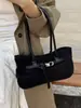 Bolso de hombro de diseño nicho estilo coreano para mujer, otoño temprano 2026, bolso de mano retro a la moda para el trabajo, bolso de axila de lujo ligero de alta gama