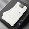 Jeans blancos de alta gama Lyocell para hombre, tres pruebas, nuevos jeans ajustados skinny elásticos para otoño e invierno con forro polar y diseño engrosado