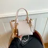 Bolsa Shuai Mi Jia de patrón tejido de nicho para mujer, nuevo bolso cruzado de moda de principios de otoño 2026, bolso de mano exquisito, bolso tipo cubo