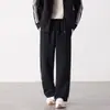 Pantalones de hombre a rayas 2026 nueva primavera y otoño versátiles con cordón holgados rectos deportivos casual largos para hombre al por mayor