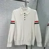 Venda Direta de Fábrica de Novos Modelos de Alta Qualidade para Outono e Inverno de Suéteres de Manga Longa com Gola Listrados em Vermelho, Branco e Azul para Homens e Mulheres
