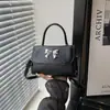 Bolso pequeño nuevo con estilo para mujer 2026 nuevo popular versátil bandolera moderno nuevo artículo bolso de mano bolso cuadrado pequeño