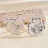 Conjunto de dos piezas de anillos y pulseras florales huecas plisadas metálicas europeas y americanas, joyería para mujer de nicho de alta gama exagerada transfronteriza