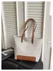 Bolso de hombro para mujer de comercio exterior nuevo al por mayor, bolso tote versátil casual de gran capacidad para el trabajo, bolso de axila de alta gama de moda