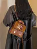 Bolso de Leopardo Súper Caliente de Nicho para Mujer 2026 Nuevo Otoño/Invierno Mochila Versátil Estilo Escolar Para Clase Viajes Diarios Mochila Escolar Pequeña