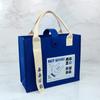 Nueva bolsa de fieltro con cinta de alta gama bolsa de fieltro de moda futura bolsa de fieltro para actividades empresariales