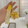Llavero de Botella de Arena Líquida de Dibujos Animados, Pequeños Regalos para Puestos, Accesorios Acrílicos al por Mayor, Colgante Relleno de Aceite, Rasca Gatos Lindo de Regalo