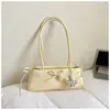 Bolso de Mano Exquisito con Lazo de Nicho de Verano para Mujer 2026 Nueva Moda Lunares Bolso de Hombro de Alta Gama