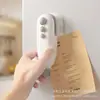 Mini selladora doméstica automática eléctrica selladora térmica portátil bolsa de plástico bolsa de snacks pequeño artefacto de presión manual
