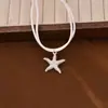 Moda Europea y Americana Estrella de Mar Bailarina Set de Collar y Aretes Estilo Festivo Cuerda de Terciopelo de Doble Capa Serie Oceánica Collar y Aretes