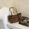 Bolsa de ombro transfronteiriça, leve, estilo retrô, casual para mulheres, perfeita para o outono, simples e versátil, adequada para saídas diárias e deslocamentos, com um toque de alta qualidade