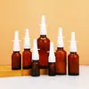 Al por mayor en stock botella de vidrio ámbar de 30 ml para spray nasal, botella de vidrio con pulverizador directo para administración nasal, botella con pulverizador ámbar a prueba de luz