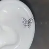 Brincos de luxo com micro-zircônias e pequenas lâmpadas brilhantes, modelo 2026, com rosca coclear e base plana.