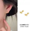 Pendientes de botón de plata de ley S999 con aguja, nudo de mariposa hueco, para mujer, moda, versátiles, de lujo, sensación de alta gama, adornos para la oreja, nuevo estilo 2026