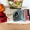 Invierno Nuevo Moda Coreana Infantil Etiqueta Lateral Simple Botón Sombrero a Prueba de Frío con Bufanda Integrada Sombrero Versátil Sombrero de Rafia
