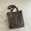 2025 Rayas Gran Capacidad Otoño e Invierno Nueva Moda Color de Contraste Tendencia Casual Viaje Diario Casual Bolso Tote para Axila Hombro