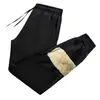 Pantalones gruesos de lana de cordero con forro polar para hombre, talla grande, corte holgado, pantalones largos casuales, pantalones deportivos cálidos de invierno para hombre