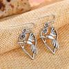 Pendientes de colibrí retro japoneses y coreanos Cao Shi moda callejera geniales hip hop moda colgante de flor Pendientes de pájaro versátiles para mujer