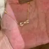 Nuevo estilo de collar de lazo con incrustaciones de diamantes, de alta gama, elegante, exquisito, cadena para la clavícula de lujo ligero con detalles de diamantes