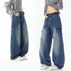 Jeans de trabajo estilo americano azul claro, pierna ancha, corte holgado con una caída favorecedora, diseño recto que estiliza, disponibles en negro y azul, con diferentes composiciones de tela