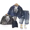 Conjunto de Dos Piezas de Camisa de Manga Corta con Estampado de Dibujos Animados y Pantalones Largos de Algodón de Manga Larga, Nueva Moda de Primavera para Niños, Venta al por Mayor desde el Fabricante