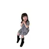 Vestido a Cuadros con Cuello de Muñeca Elegante para Niñas 2026 Verano Nueva Moda Vestido Dulce con Mangas Abullonadas Infantil Moderno