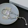 Collar de Perlas de Metal Europeo y Americano con Empalme Degradado de Tamaño para Mujer Lujo Accesible Diseño de Nicho Cadena para Suéter de Gama Alta Cadena para Clavícula