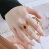 Anillo de dedo femenino en forma de huevo con temperamento de flor de hielo de corindón de imitación chapado en oro de cobre de joyería Zhuangshang 7*9