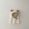 Bonitos y adorables gorros de otoño e invierno para niños, con diseño de poner, material de punto y una serie de dibujos animados, que brindan abrigo y protección para los oídos para bebés y niños pequeños.