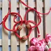 Y13 tienda de un yuan pulsera de cordón rojo tejida con núcleo de durazno pulsera de cordón rojo suministro de pequeños productos de un yuan