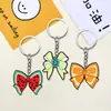 Llavero Colgante Creativo Nuevo de Niña con Lazo de Colores Plástico Suave de PVC Plástico de Gota Colgante para Mochila Escolar Regalo al por Mayor