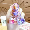 Bolsa Escolar con Líquido de Arenas Movedizas Rellenas de Aceite, Llavero de Botella, Exquisitos Colgantes, Adornos, Accesorios, Máquina de Peluches, Regalos Pequeños, Venta al por Mayor