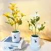 Popular Transfronteiriço 10 Peças Flor Artificial Lírio Pequena Planta em Vaso para Decoração de Casamento, Ornamentação Bonsai Flor Falsa de Tecido de Seda