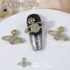 Joyería Transfronteriza para Uñas de Nueva Emperatriz Dowager Aleación Oscura Retro Diamante Planeta Cruz Decoración de Uñas Venta al por Mayor