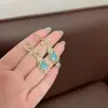 Pendientes de Hoja con Piedra Ojo de Gato Suaves y Frescos Estilo Francés, Súper Brillantes y Exquisitos, Elemento Popular de Celebridad de Internet de Lujo Ligero, Pendientes de Lazo Incrustados de Diamantes