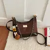 Bolso pequeño estilo Chanel con patrón de diamantes para debajo del brazo para mujer 2026 nuevo elegante simple de un solo hombro bandolera bolso de cadena elegante
