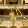 2026 Año del Caballo Dibujo Animado Pony Llavero Colgante de Bolso Zodiaco Caballo de la Riqueza Colgante de Lámina de Oro Regalo Creativo Al por Mayor