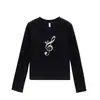 Camiseta blanca de manga larga para mujer, cuello redondo, hombros normales, nuevo estilo primavera y otoño, estampado de nota musical de dibujos animados, corte ajustado, top versátil