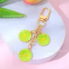 Estilo Ins Flor de Margarita con Goteo de Aceite Borla Llavero Creativo Colgante para Bolsa de Auriculares de Niñas Venta Caliente