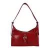 Bolso de axila de nicho estilo francés para mujer, nuevo modelo 2026, cuero encerado al aceite, versátil para el trabajo, bolso cruzado de moda tipo dumpling