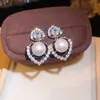 ¡Fantasía que acelera el corazón! Aretes de Perla con Forma de Corazón de Zirconia, Aretes Suaves y Elegantes con un Toque de Lujo Ligero y Sensación de Alta Gama, Accesorios para Orejas de Moda al por Mayor