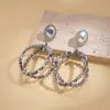Brincos Geométricos Ovais Vazados de Vidro com Pedras de Diamante Personalizados Estilo Europeu e Americano, Brincos de Nicho Únicos de Alto Padrão