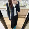 Camiseta de retazos florales dulce picante americana de dos piezas falsas, manga larga, para mujer, estilo nuevo de otoño, capa interior de algodón puro, ajuste ceñido, top base