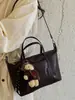 Bolso de mano grande informal retro para mujer transfronterizo, nuevo estilo 2026, versátil bolso de hombro y bolso cruzado para ir al trabajo, bolso tote para mujer