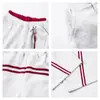 Pantalones Jogger Rayados Estilo Americano de Marca Popular para Hombre, Nuevo Modelo Otoño e Invierno con Hebilla en Forma de Corazón y Decoración de Cordón, Pantalones de Pierna Ancha Sueltos de Moda para Mujer