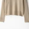 Venta al por mayor de ropa para mujer estilo europeo y americano transfronteriza, estilo elegante para ir al trabajo, tacto suave, cuello redondo, suéter de punto de manga larga 2142191